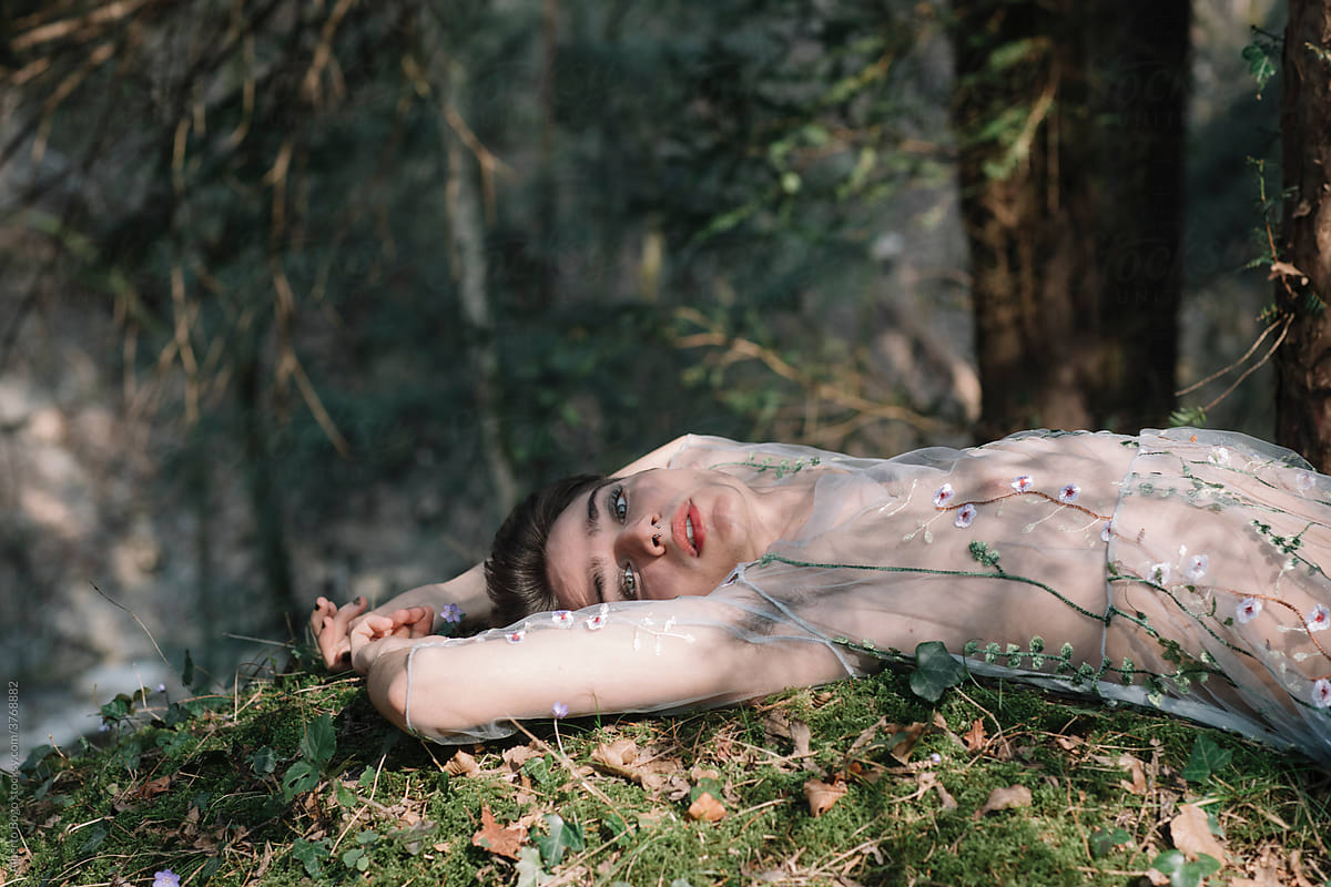 Portrait Of A Non-binary Man Lying In The Woods