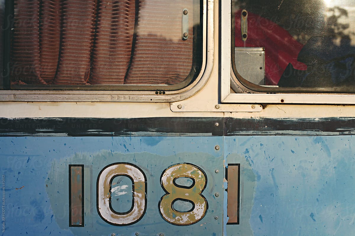 close up of old painted numbers on a bus