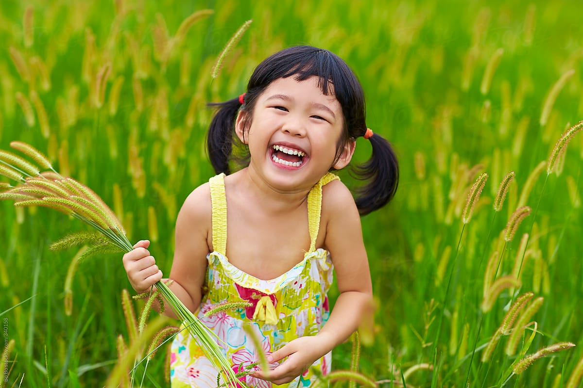 lovely little Chinese girl laughing