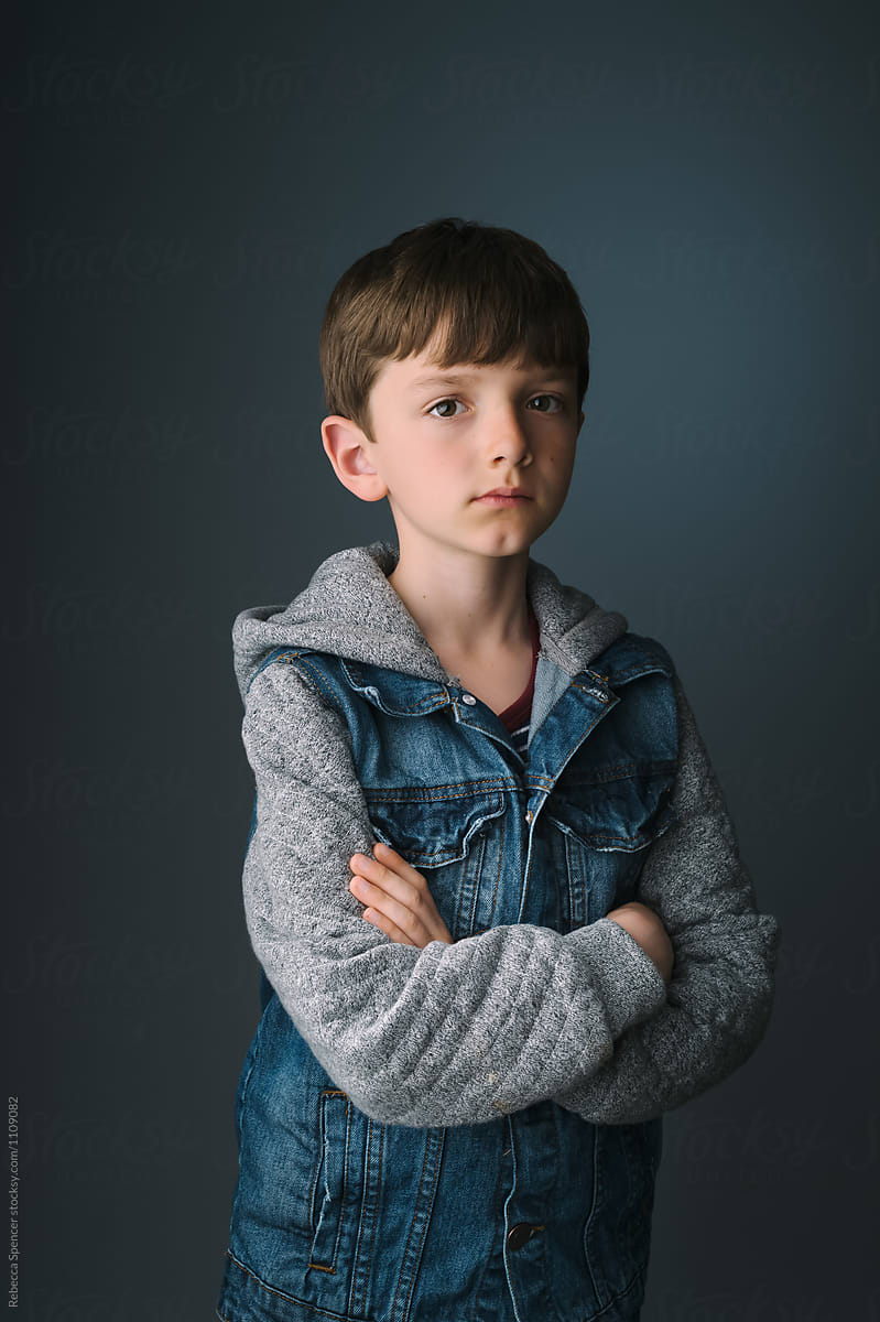 Indoor Portrait Of A Handsome Pre-teen Boy by Rebecca Spencer