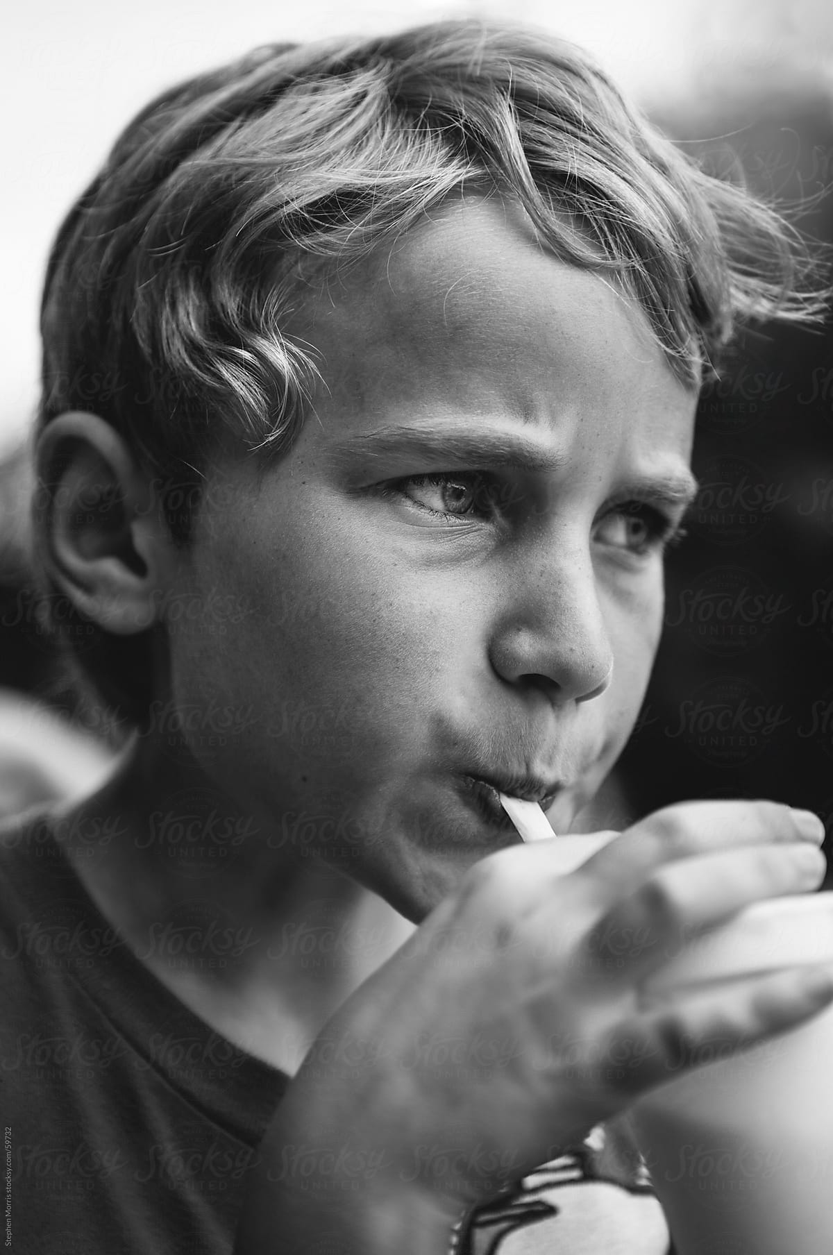 Boy Drinking a Milkshake Through a Straw