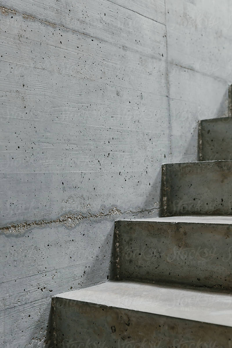 Concrete modern architect designed staircase in a Lisbon home.