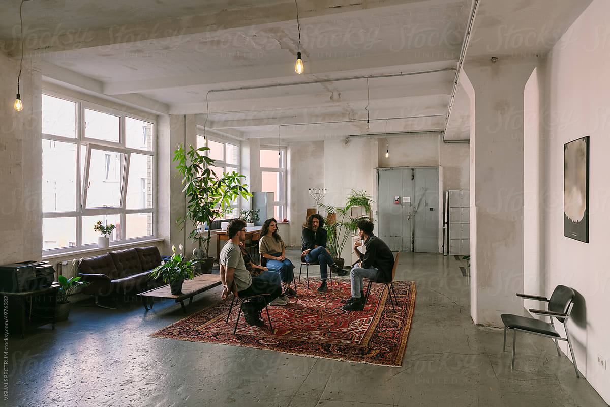 Group Therapy Sharing Circle in Large Industrial Space