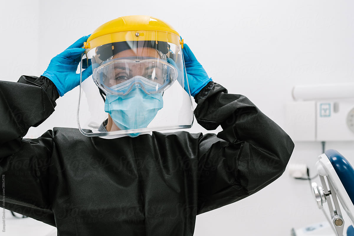 Portrait of a woman in pandemic protective clothing.