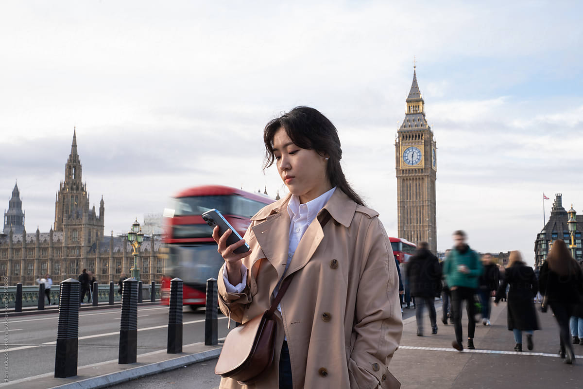 Woman Using Phone At London Street