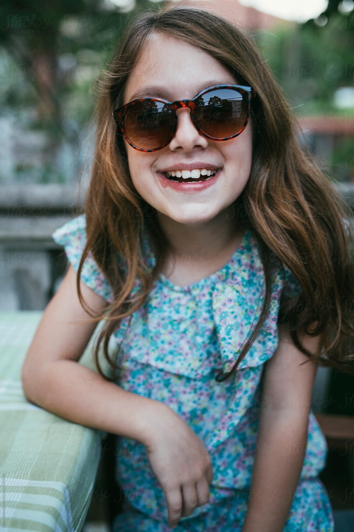 Girl With Sunglasses Smiling And Looking At The Camera By Dejan Ristovski 