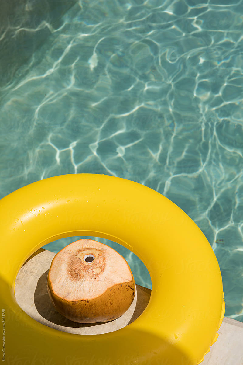 A coconut surrounded by a yellow inflatable