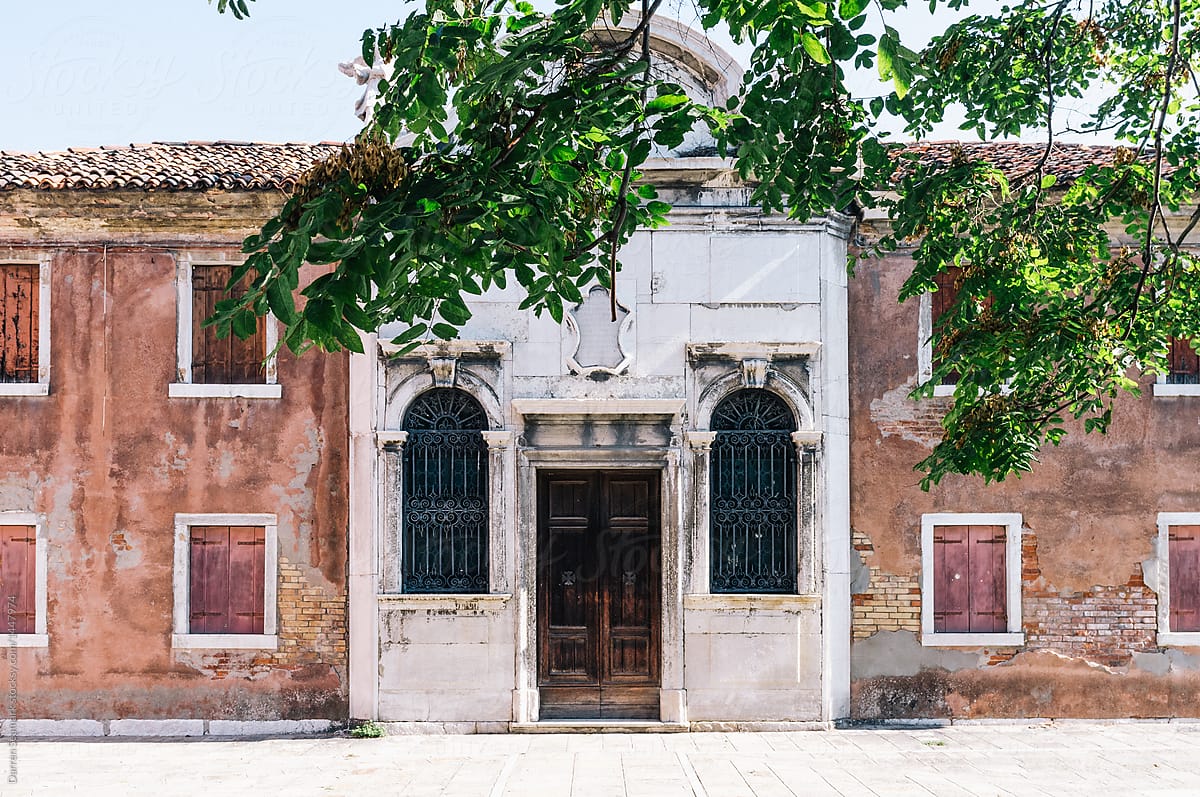 Facade and entrance door of an Italian building in Venice