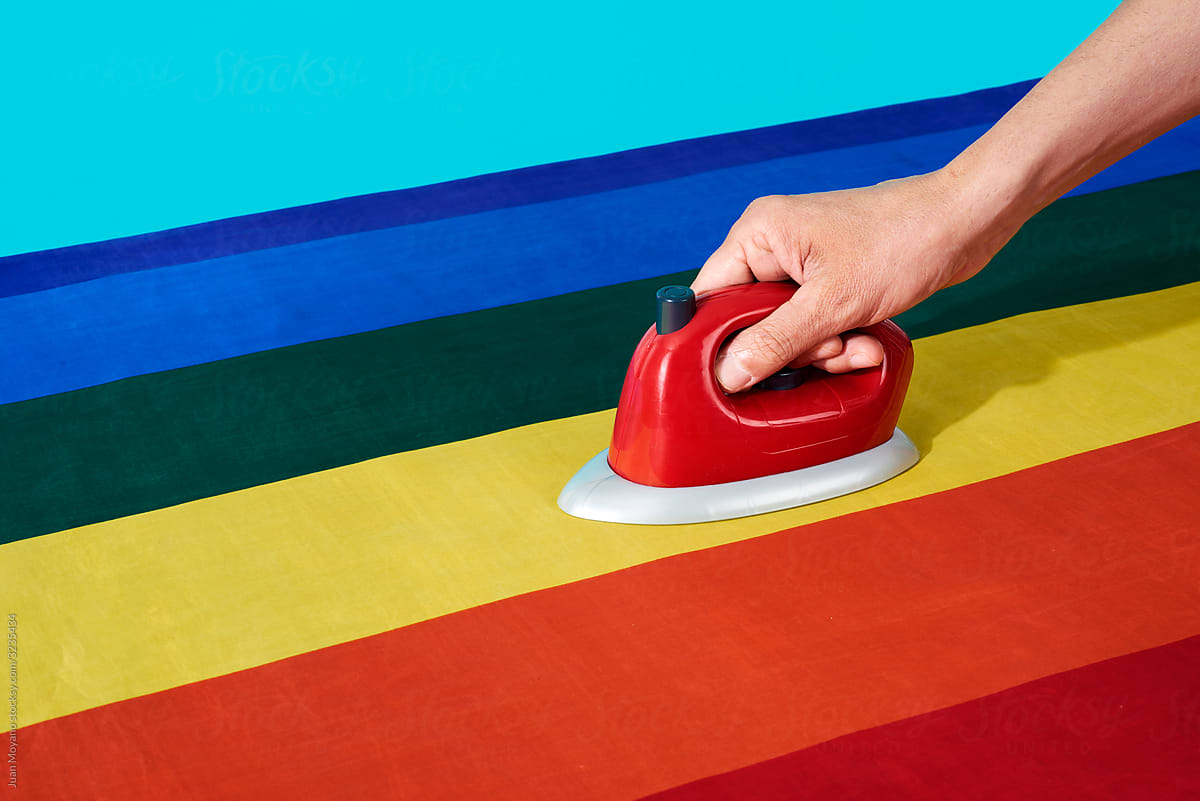 ironing a rainbow flag