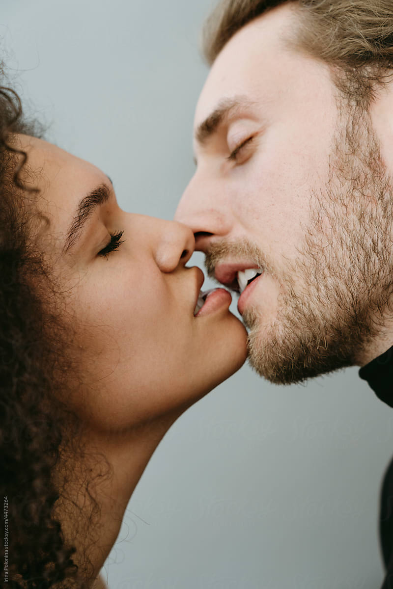 Kissing man and woman.