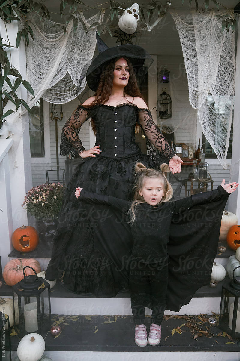 mother witch and daughter bat at halloween