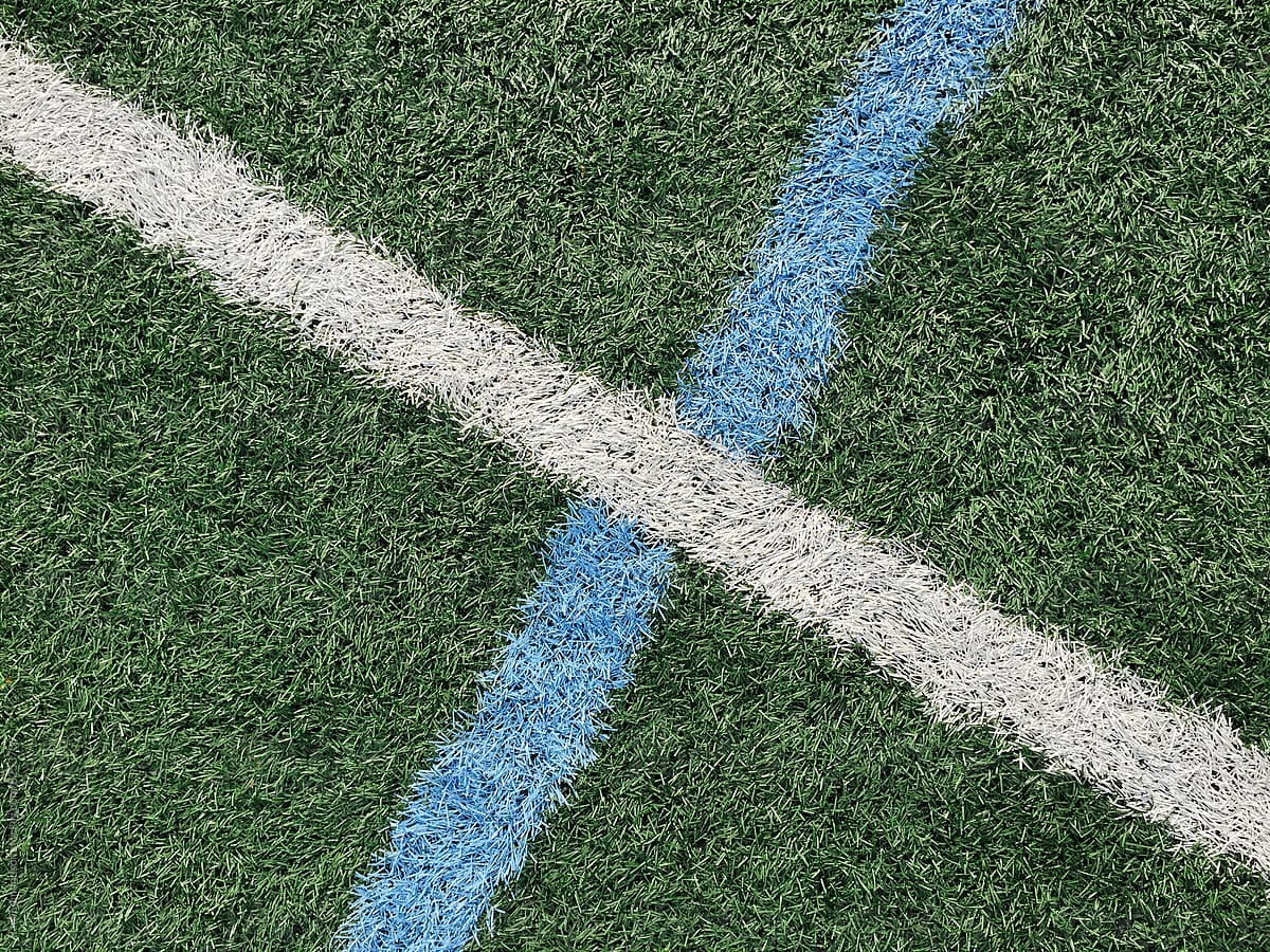 Colorful boundary lines on artificial turf sports field
