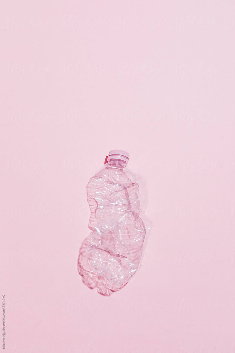 Plastic bottle on pink background. Recycle.