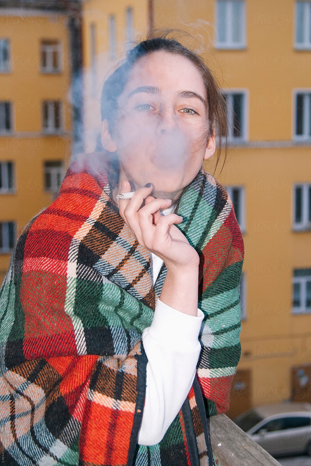 Young woman smoking a cigarette