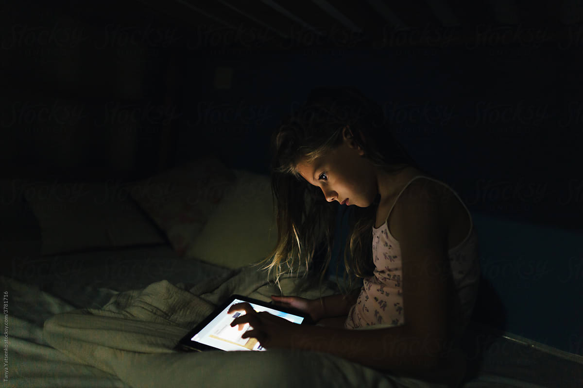 A girl with a tablet computer