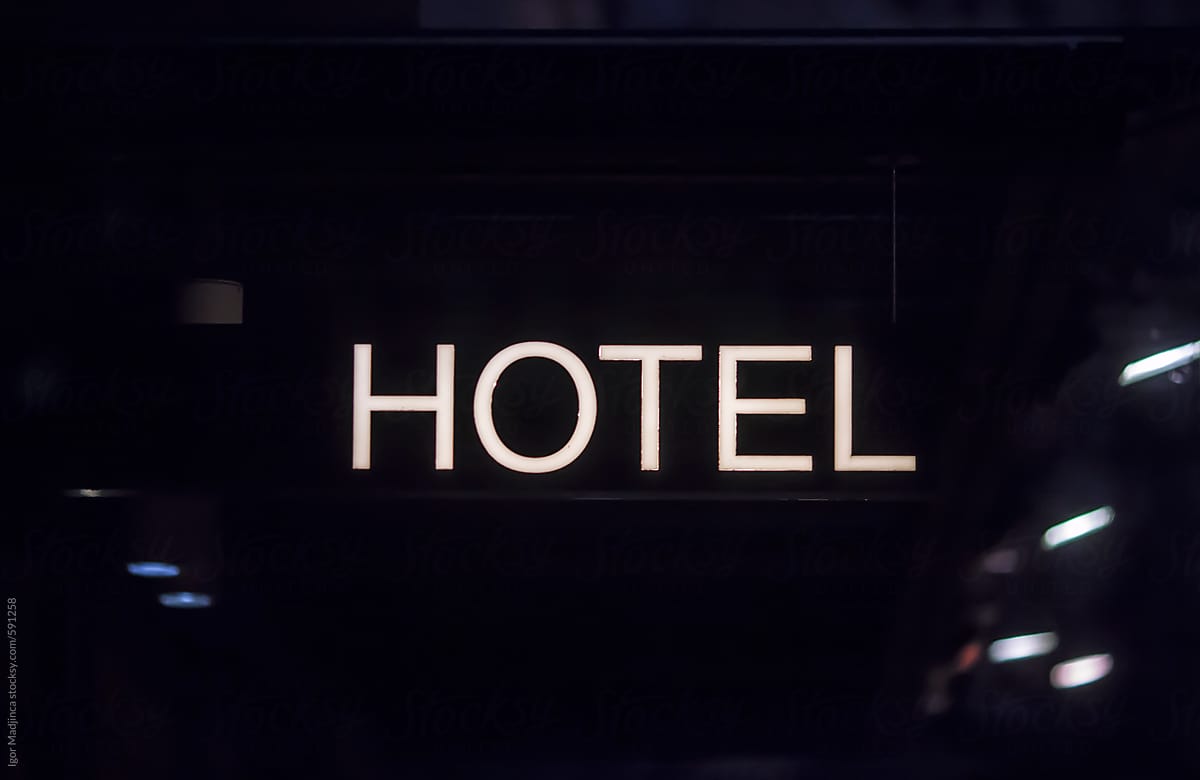 Hotel neon sign in a dark part of the city