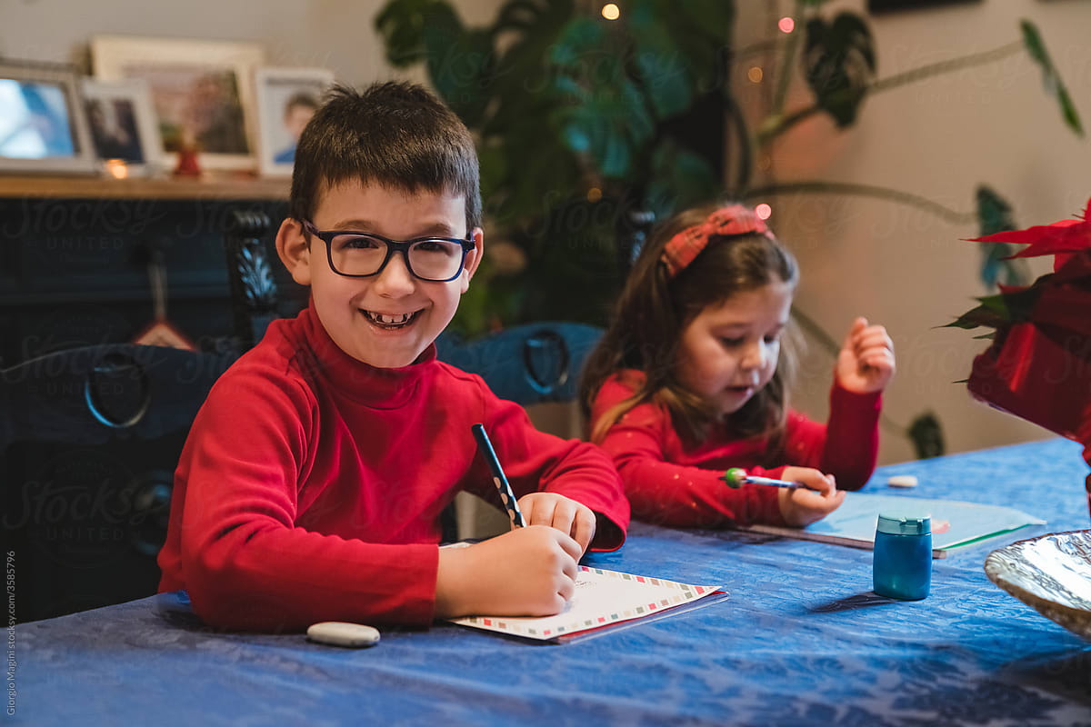 Happy Boy Writing to Santa for Christmas