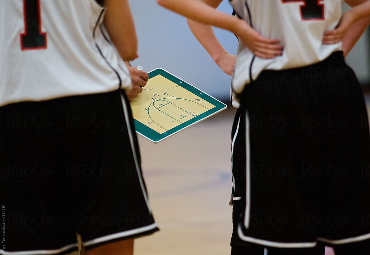 basketball play drawn on clipboard