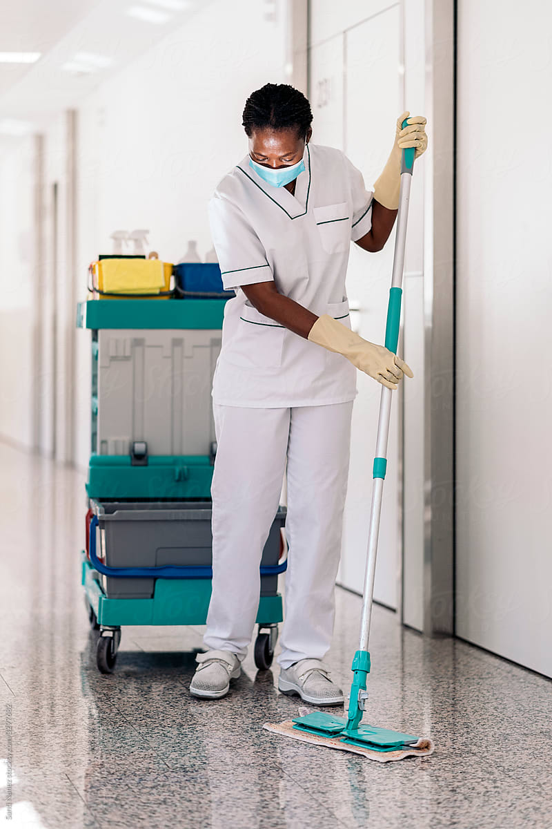 Cleaning Worker Disinfecting Hospital