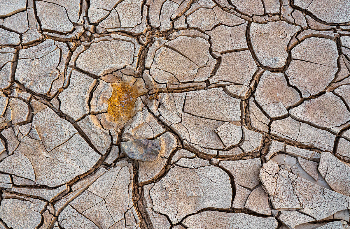 Cracked surface of dry ground textures, top view, abstract background