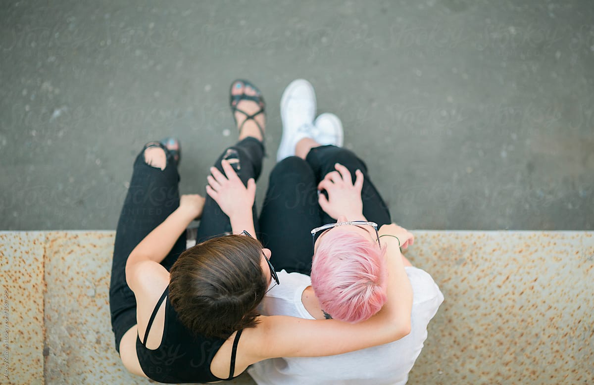 Lesbian Couple On The Street By Stocksy Contributor Alexey Kuzma Stocksy