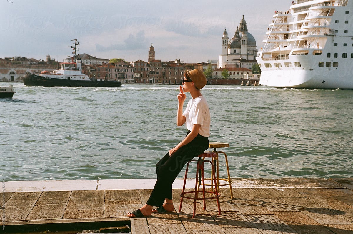 A beautiful woman smoking in Venice