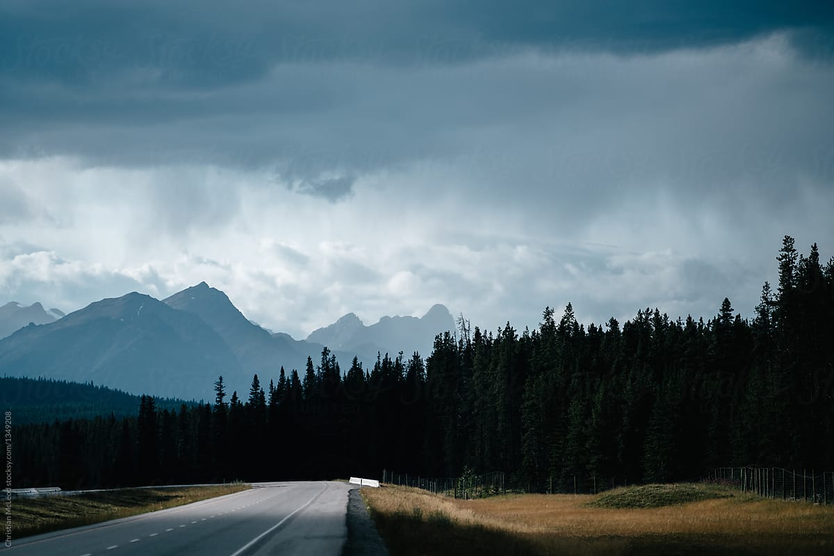 Rain storm approaches over the mountains in the canadian rockies