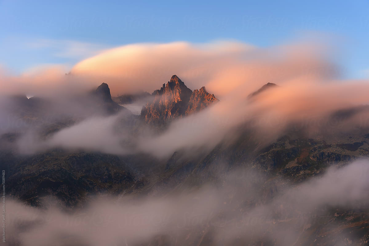Long exposed fog, clouds and mountain range