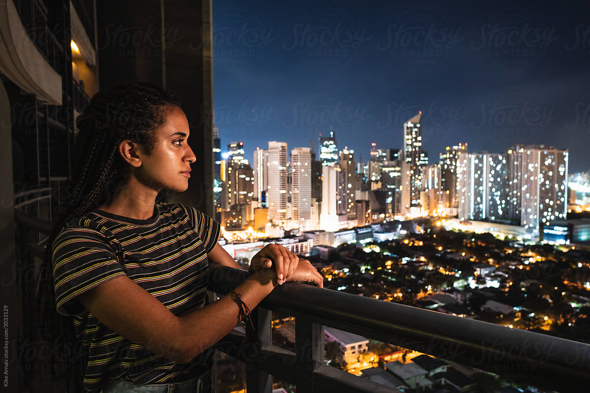 Black girl enjoying a skyline
