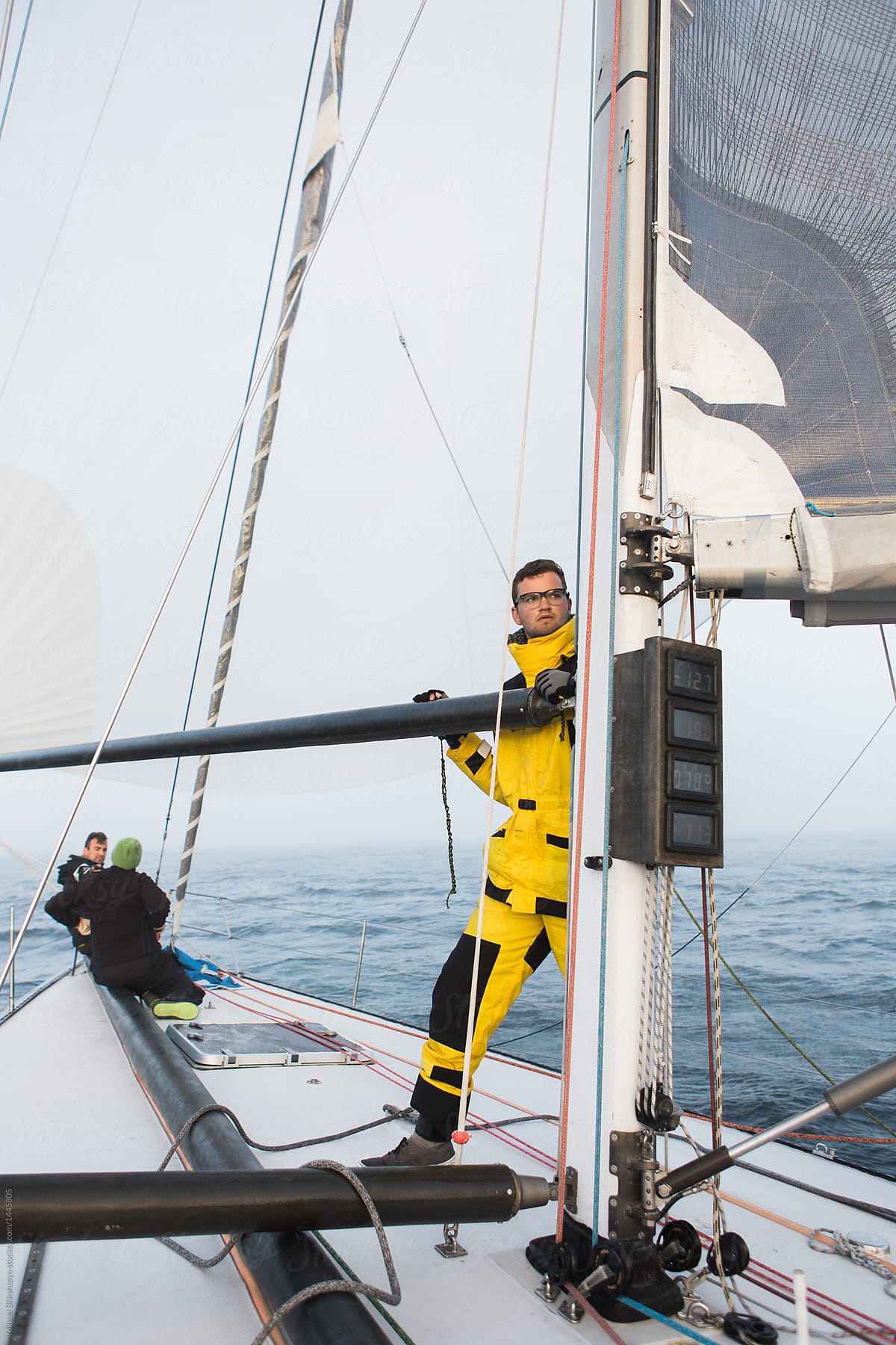 Crew on a racing sailboat or yacht