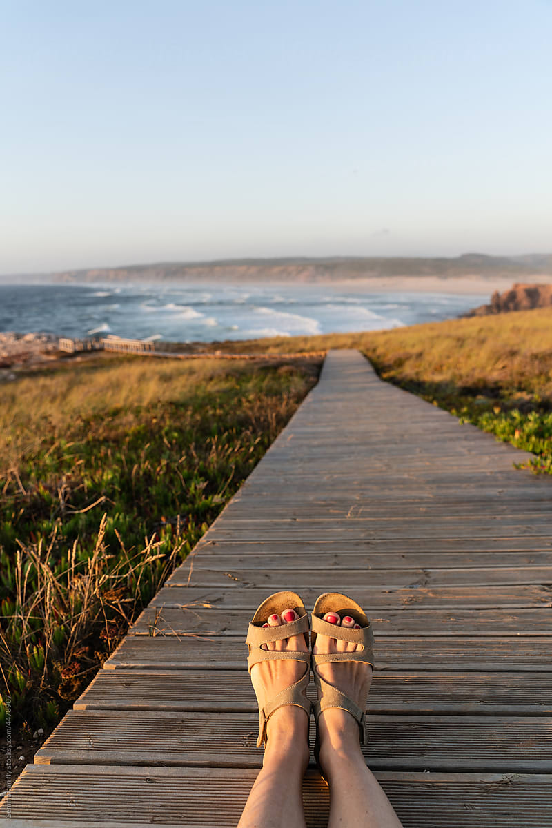 Ugc, user-generated content, woman feet travel and the sea
