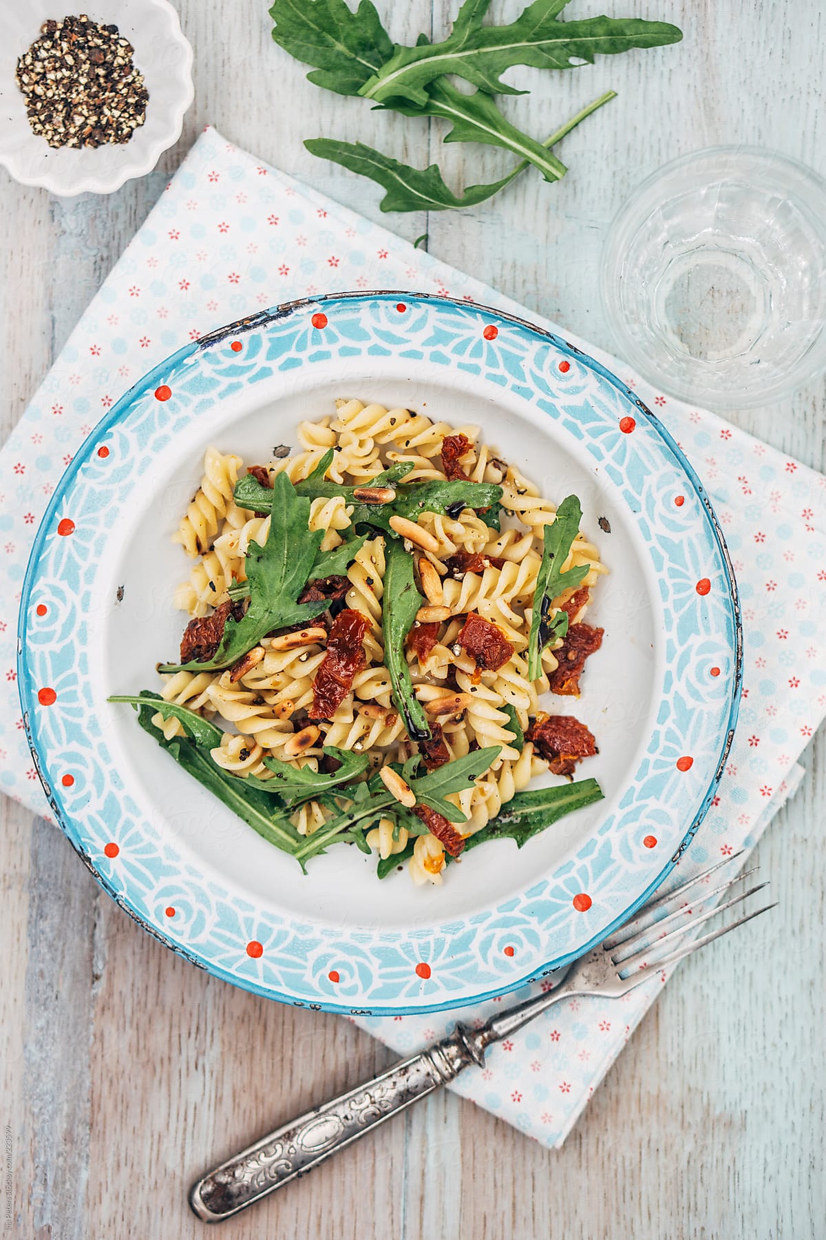 Food: Summer Salad with Noodles, dried tomato, rocket, roasted pine nuts and balsamico