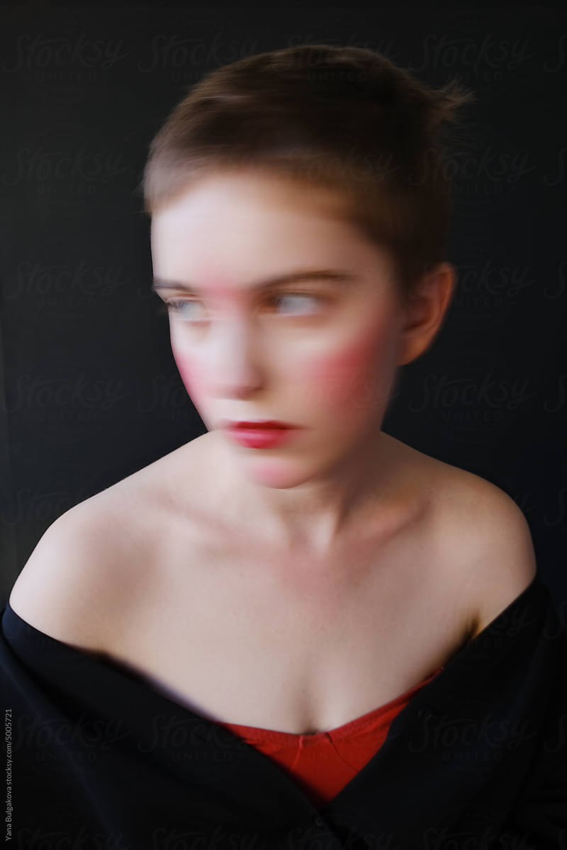 Portrait of young woman in studio