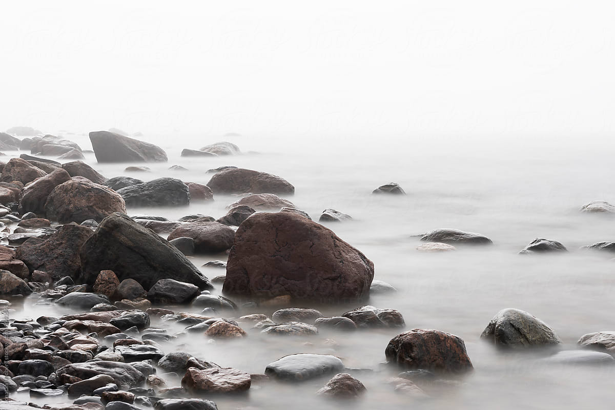 A rocky coast in fog