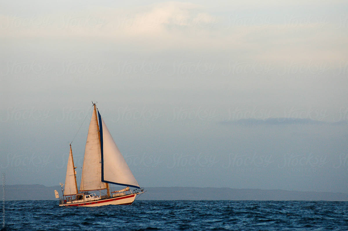 double masted sailboat is sailing in headwind