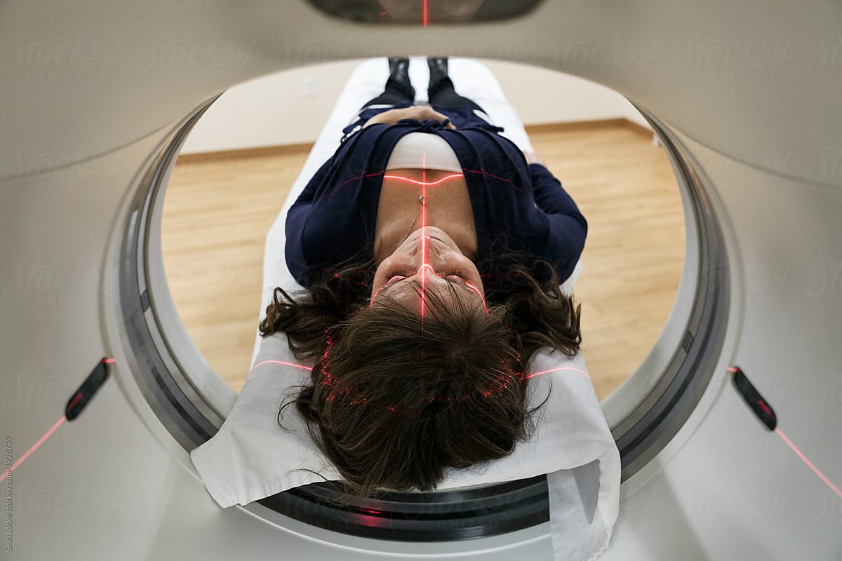 Clinic: Laser Guide Projected Onto Woman\'s Head For Scan