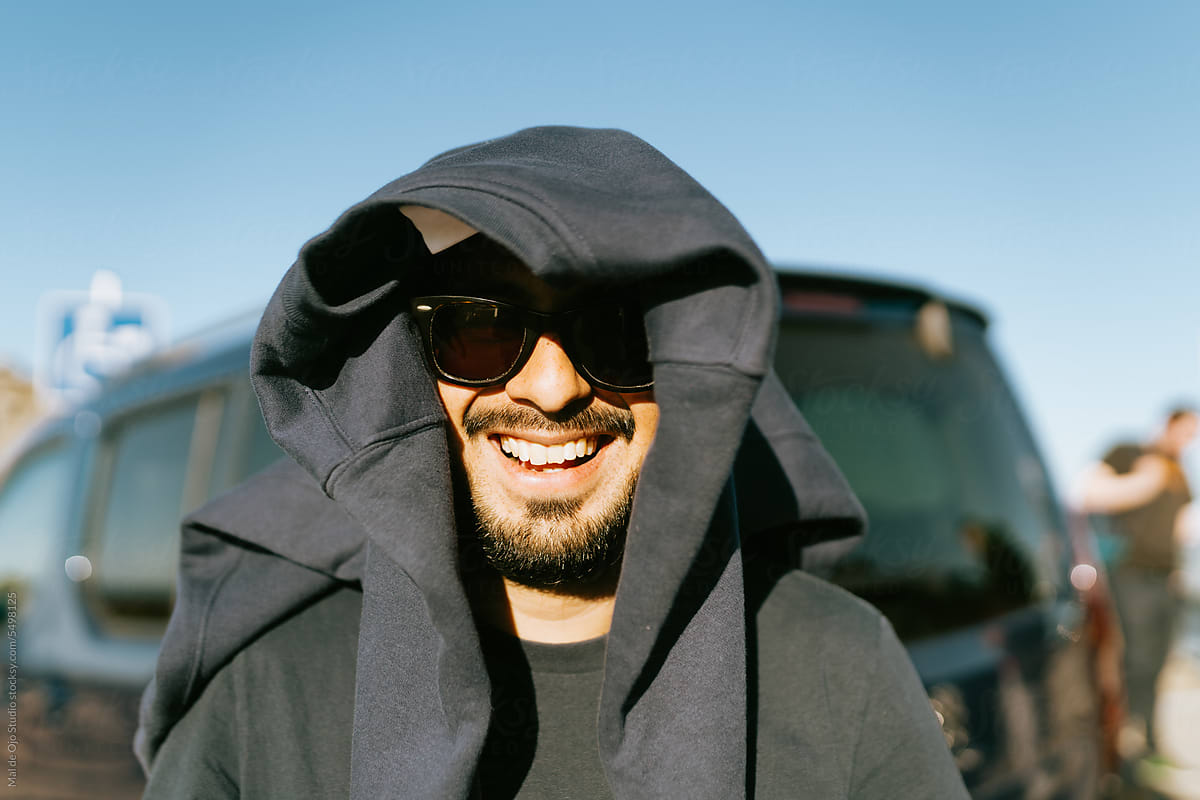 Smiling Covered Man Under Sun