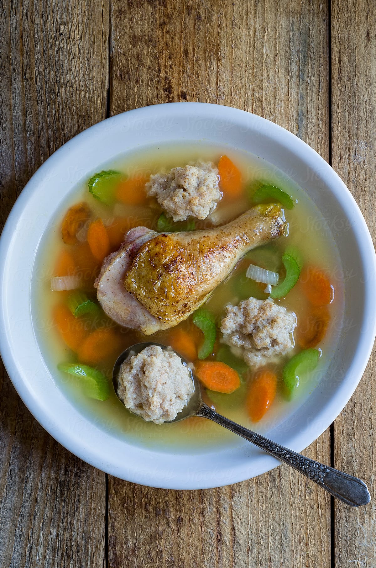 Tasty chicken soup with vegetables and dumplings