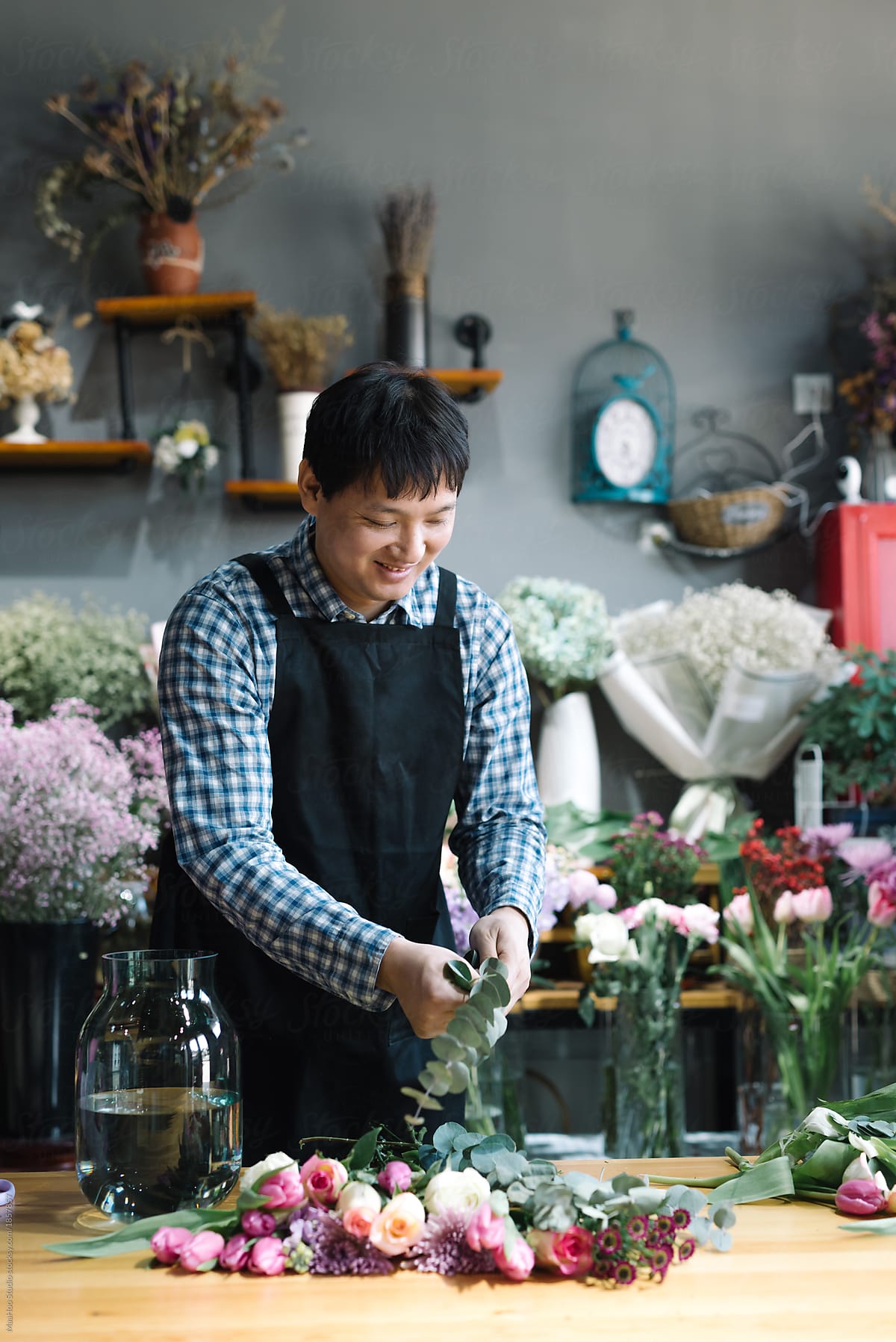 Floral shop owner working in the flower shop