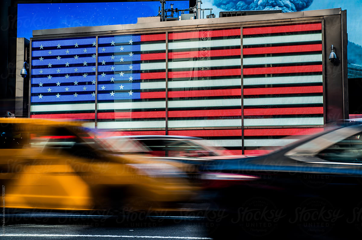 American flag digital display in Manhattan with motion blur