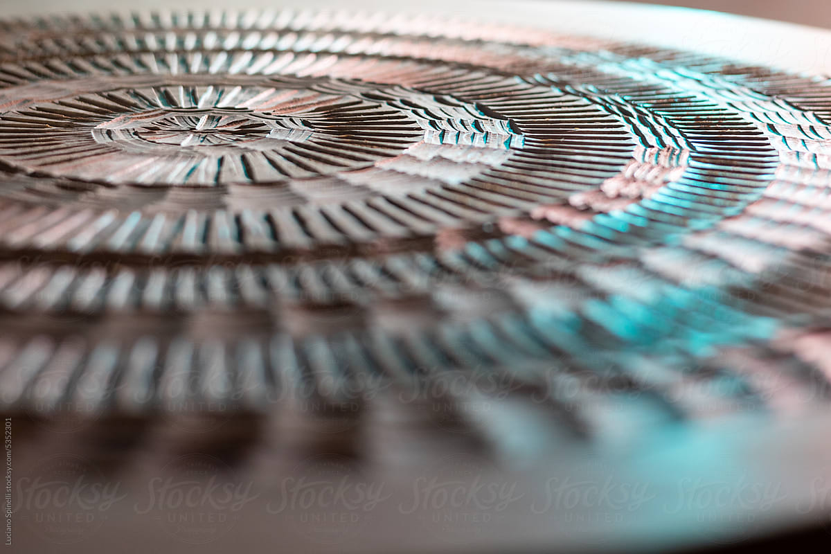 Artisanal Circular Wood Table with Symmetric Texture in Close-up View