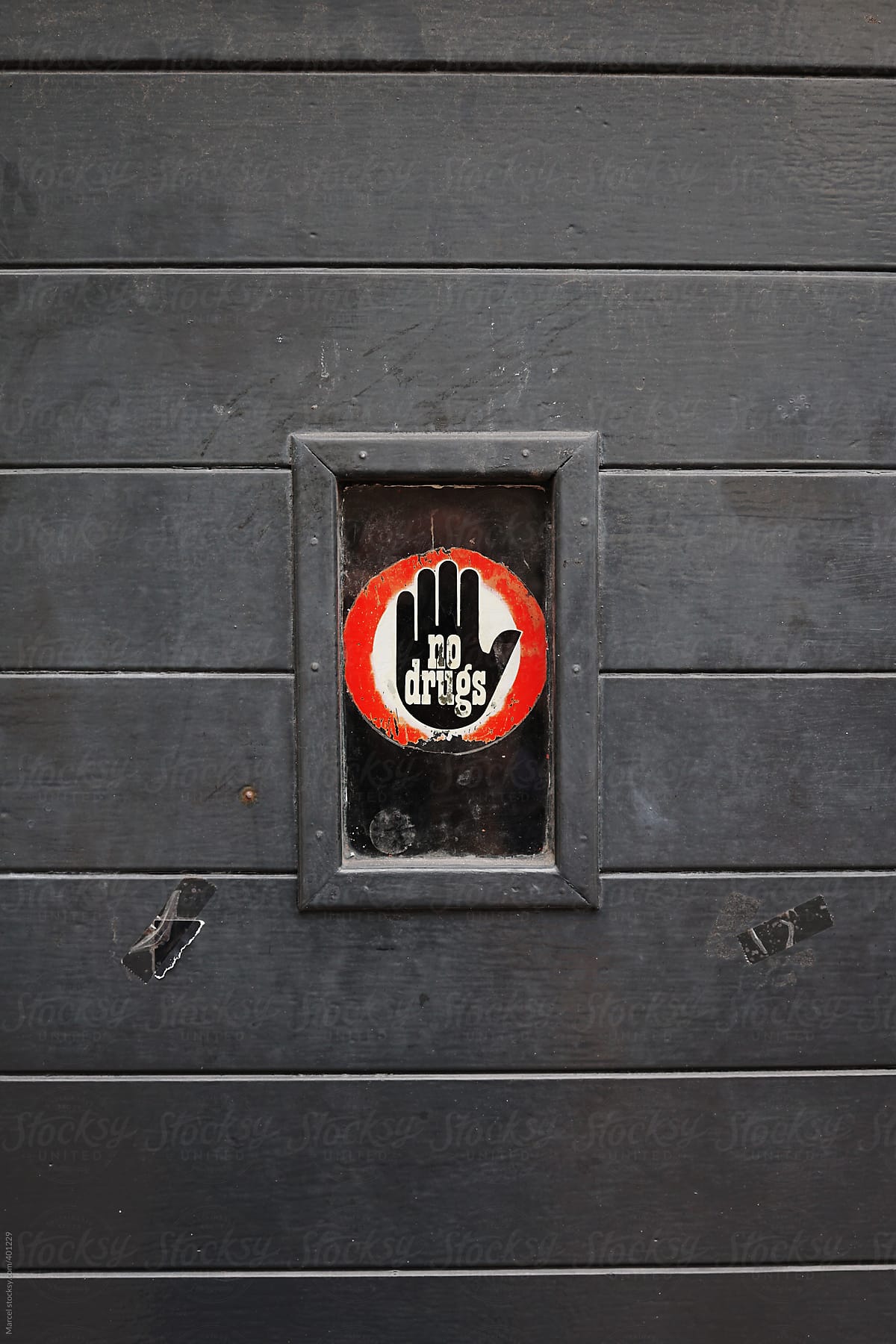 'No drugs' sign on the door of a club