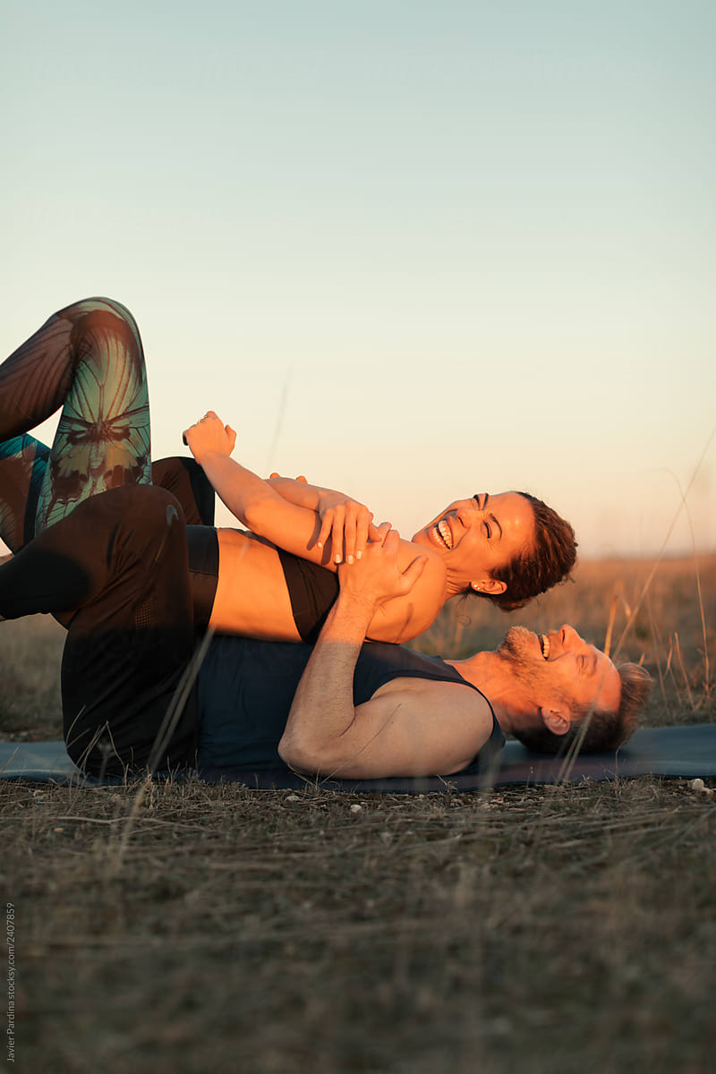 Couple Practicing Yoga By Stocksy Contributor Javier Pardina Stocksy 5978