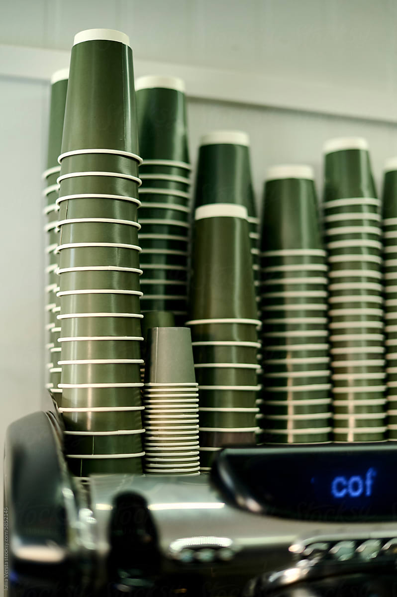 a stack of disposable coffee cups