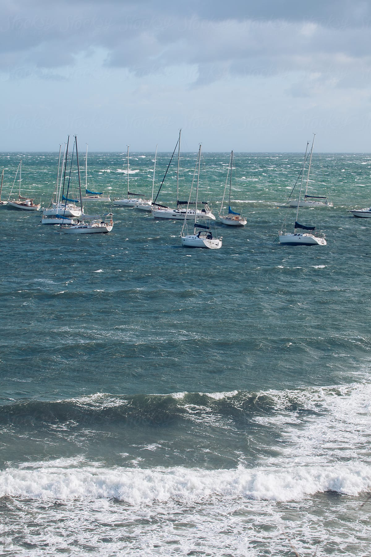 Sail Boats on choppy ocean before storm hits