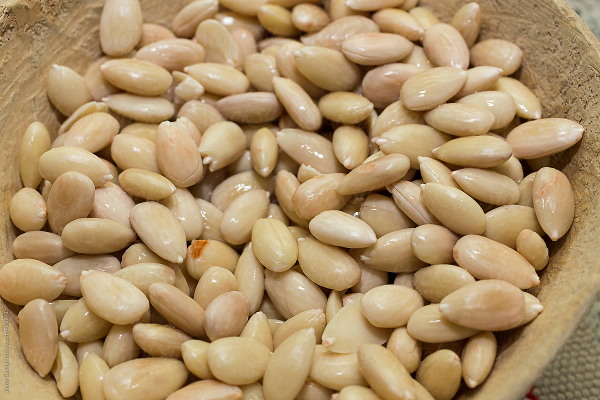 close up of shelled / peeled almonds