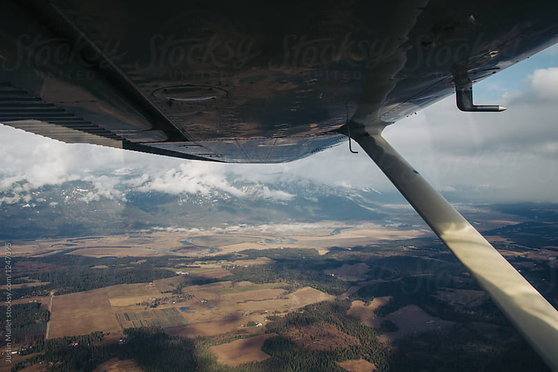 Aerial view from Cessna cockpit on rural scene in northern Idaho