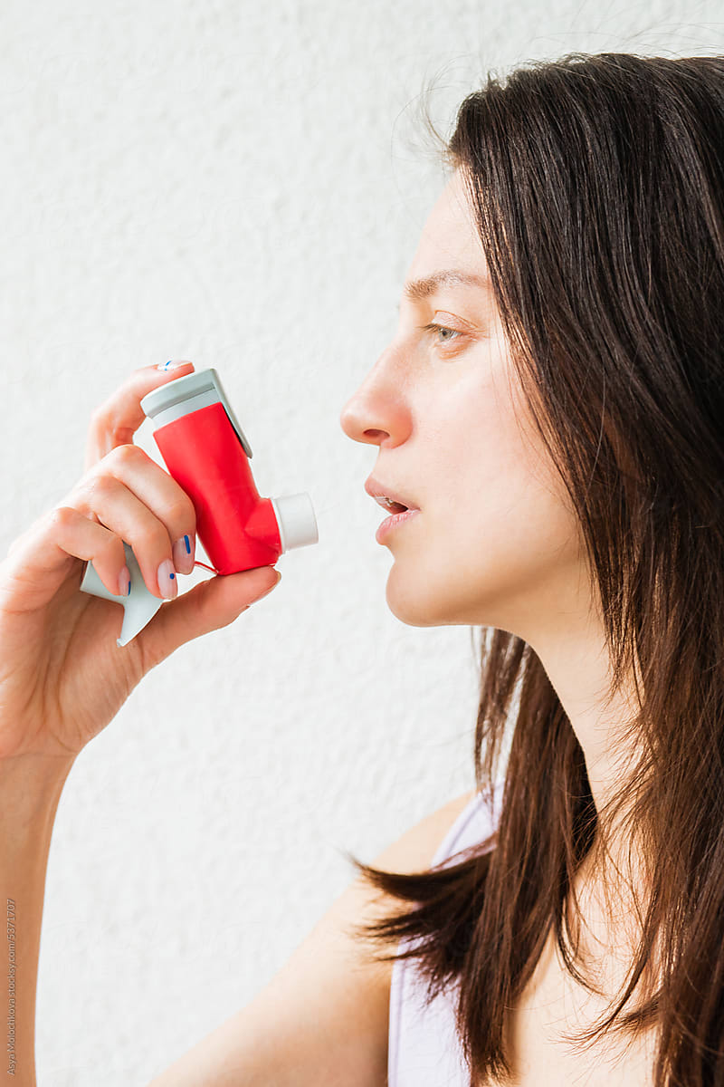 Using an inhaler during asthma