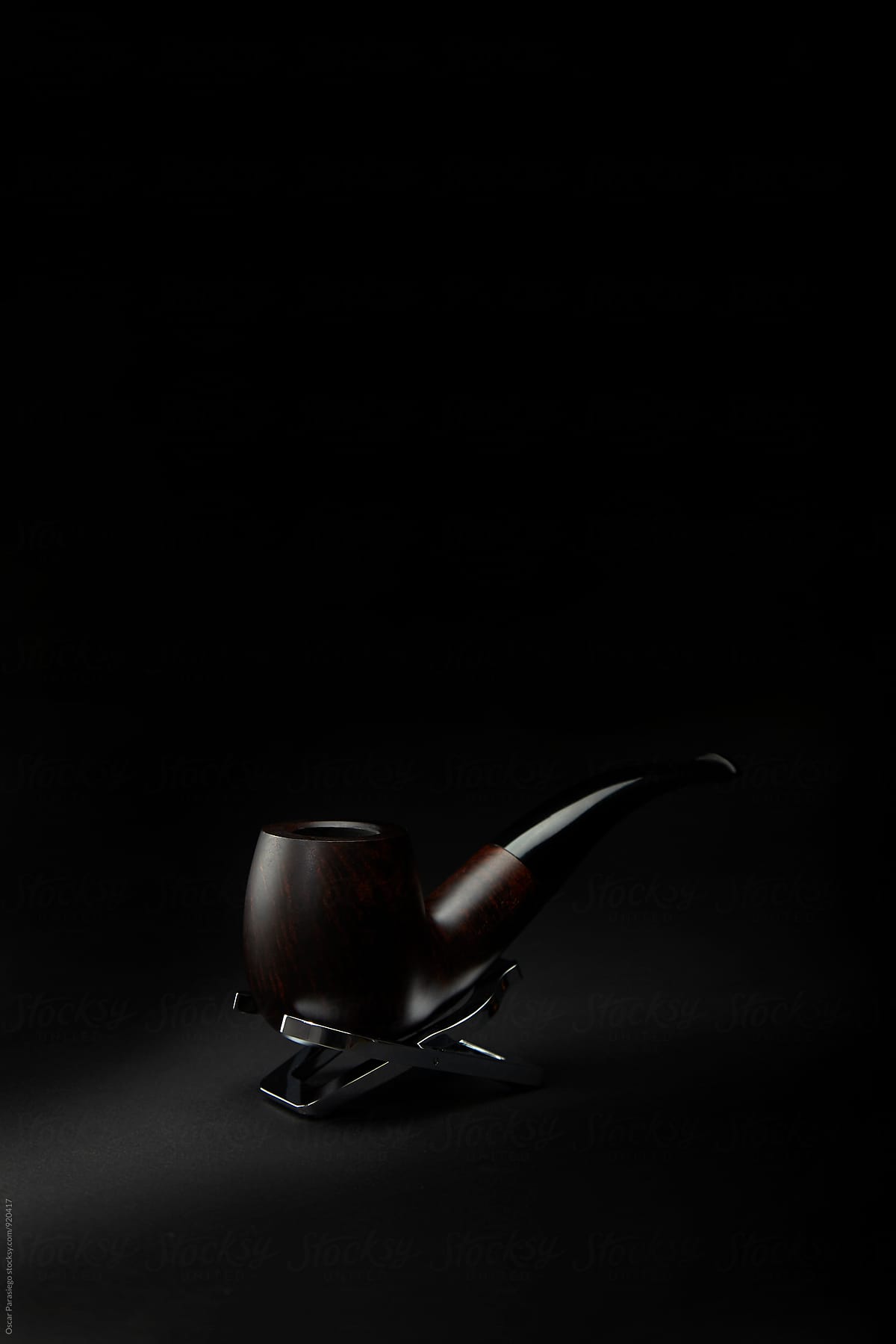 Elegant pipe in a black Background