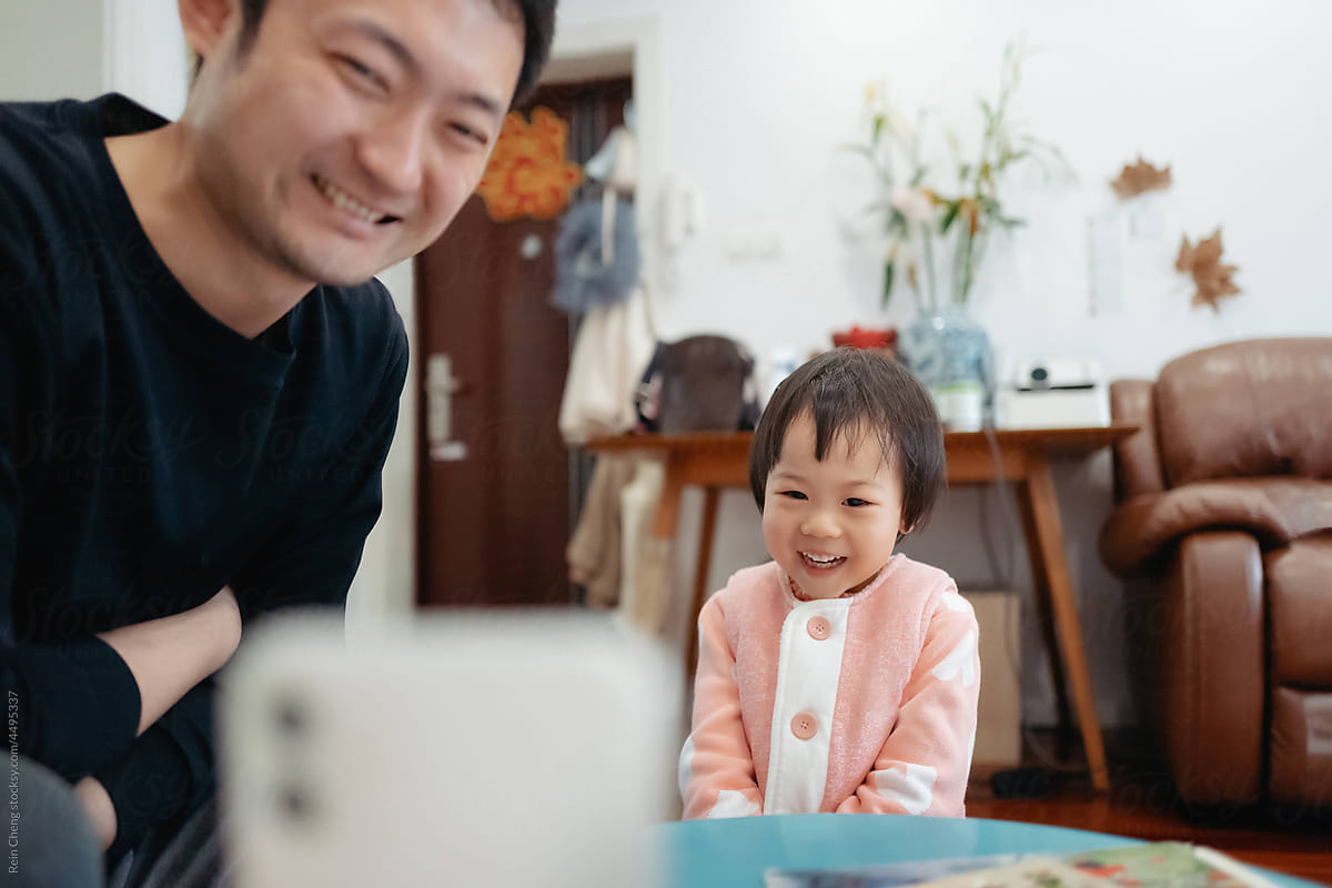 Asian family making video calls